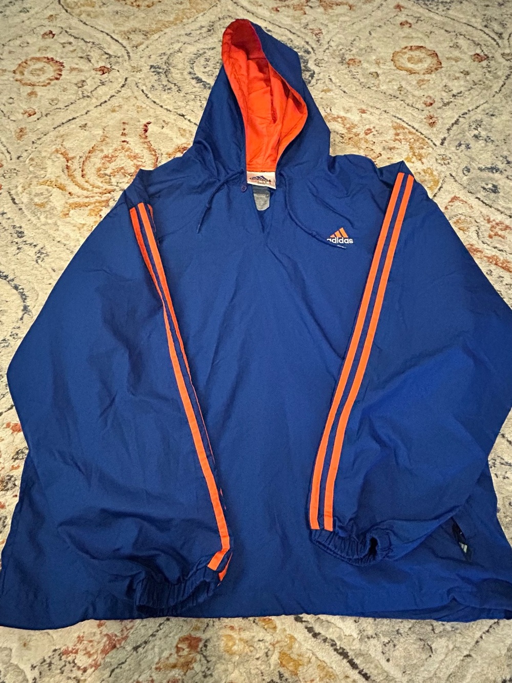 Adidas Men’s Blue Windbreaker with orange trim